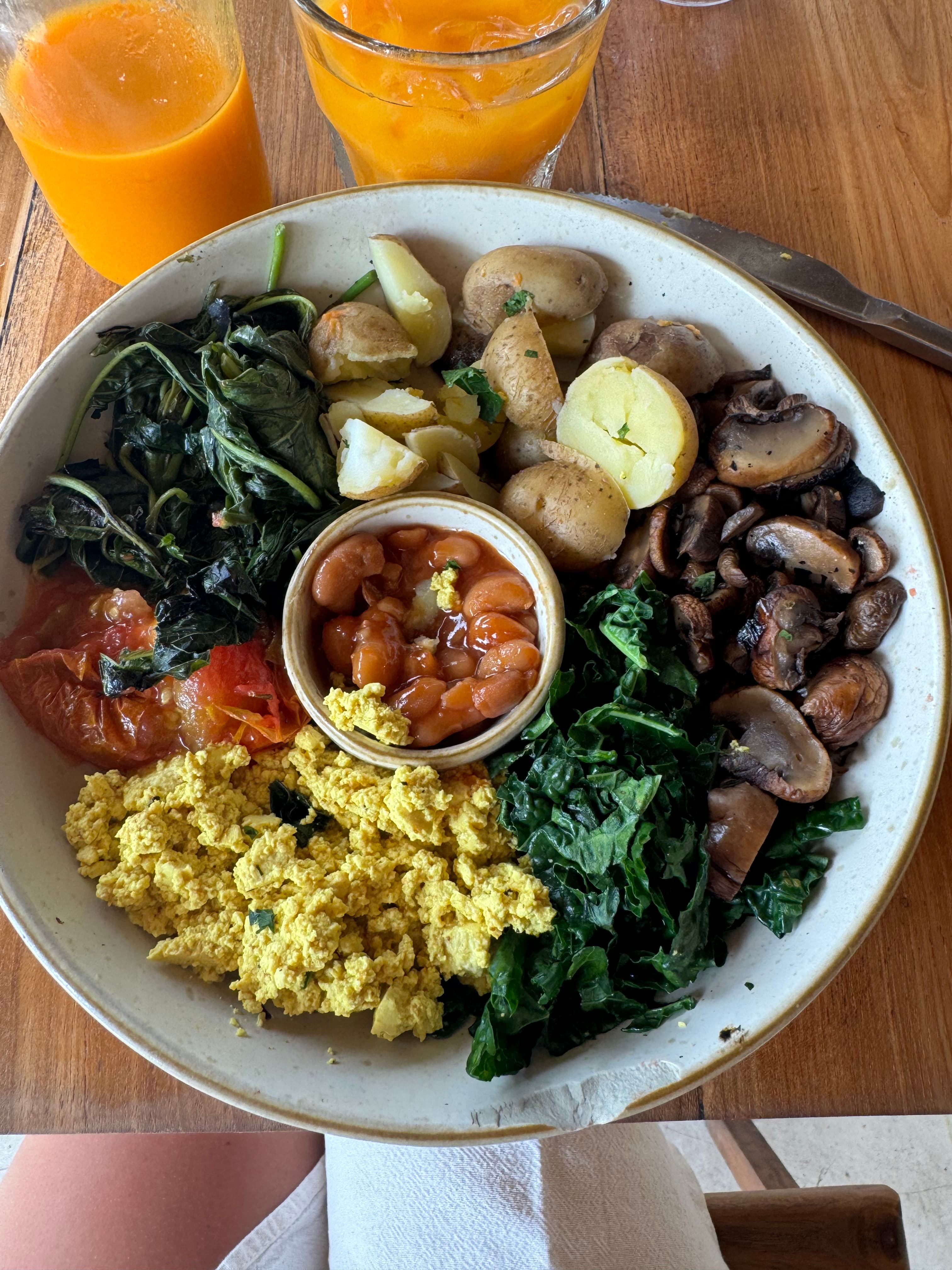 Colorful plant-based breakfast bowl on a wooden table